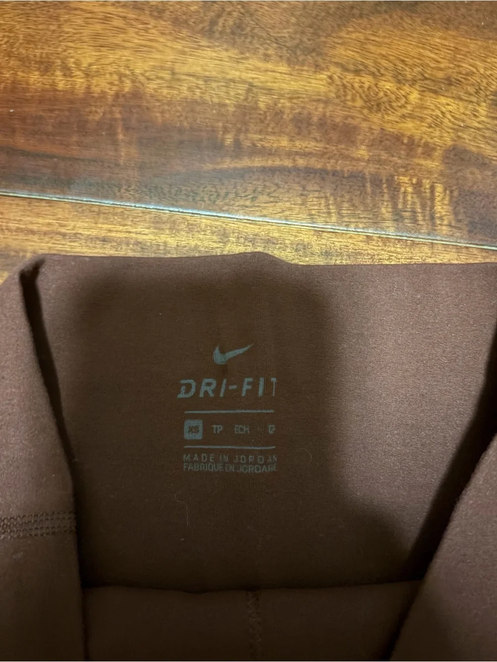 Nike Women's High-Rise Leggings in Dark Red/ Brown